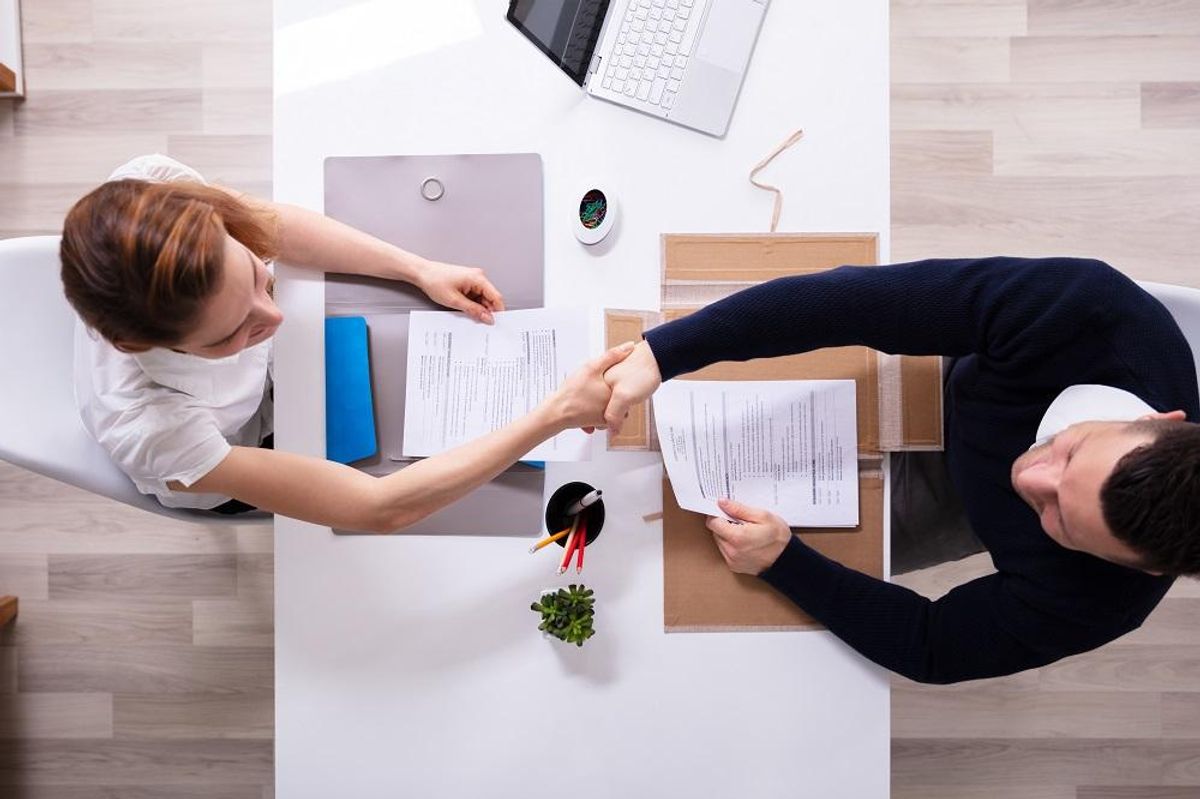 Shaking hands with a newly hired lawyer