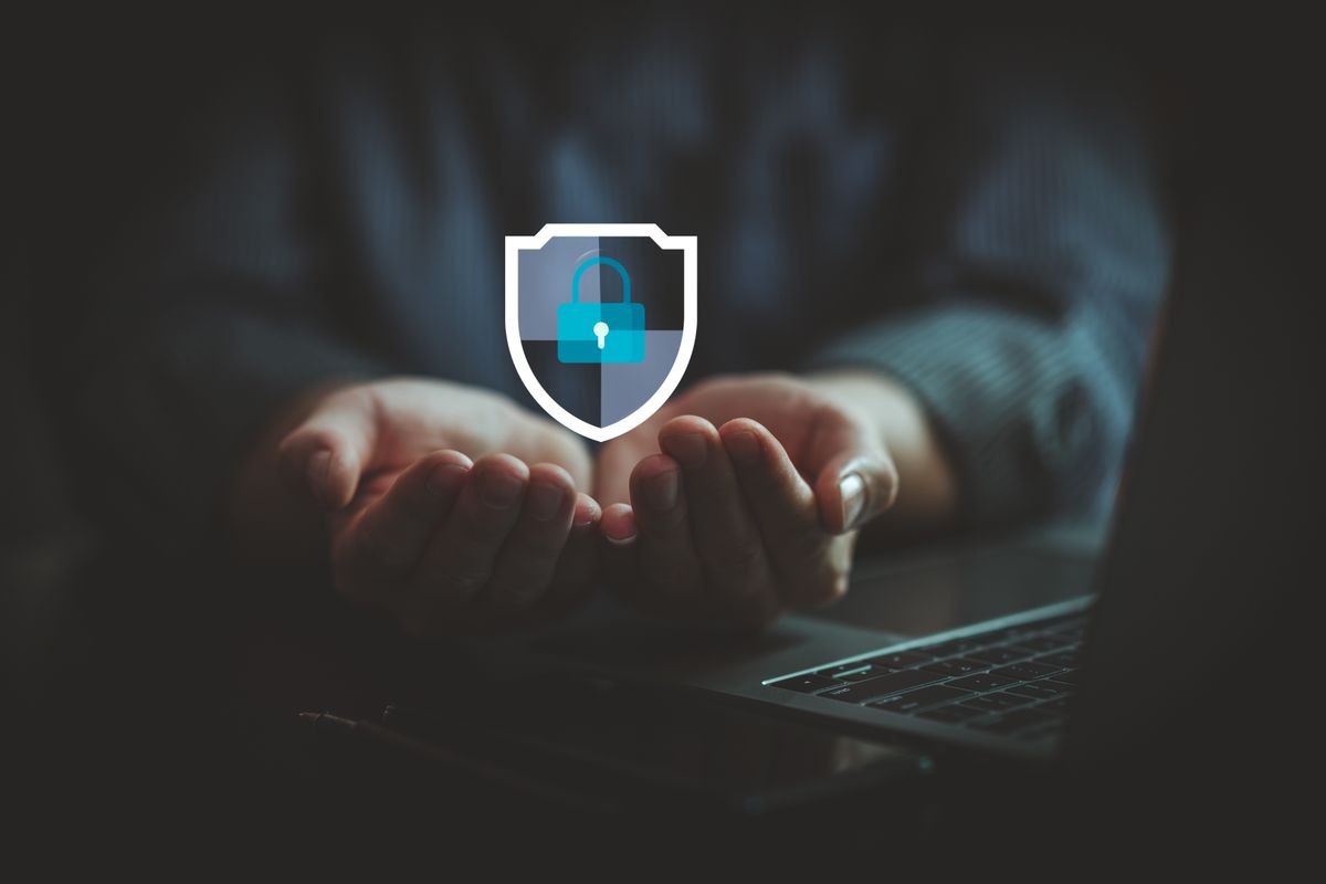 Small business owner considering cyber insurance