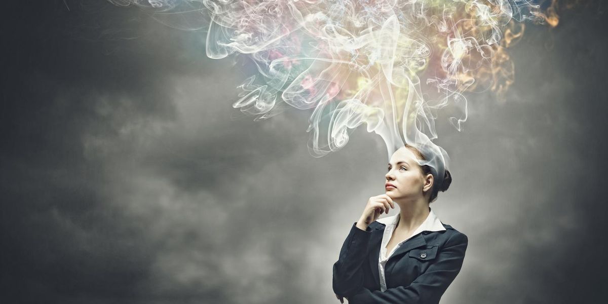 Small business owner creatively imagining her ideal business