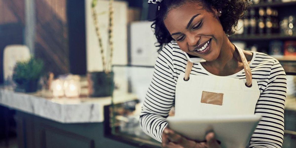 Small business owner doing marketing tasks