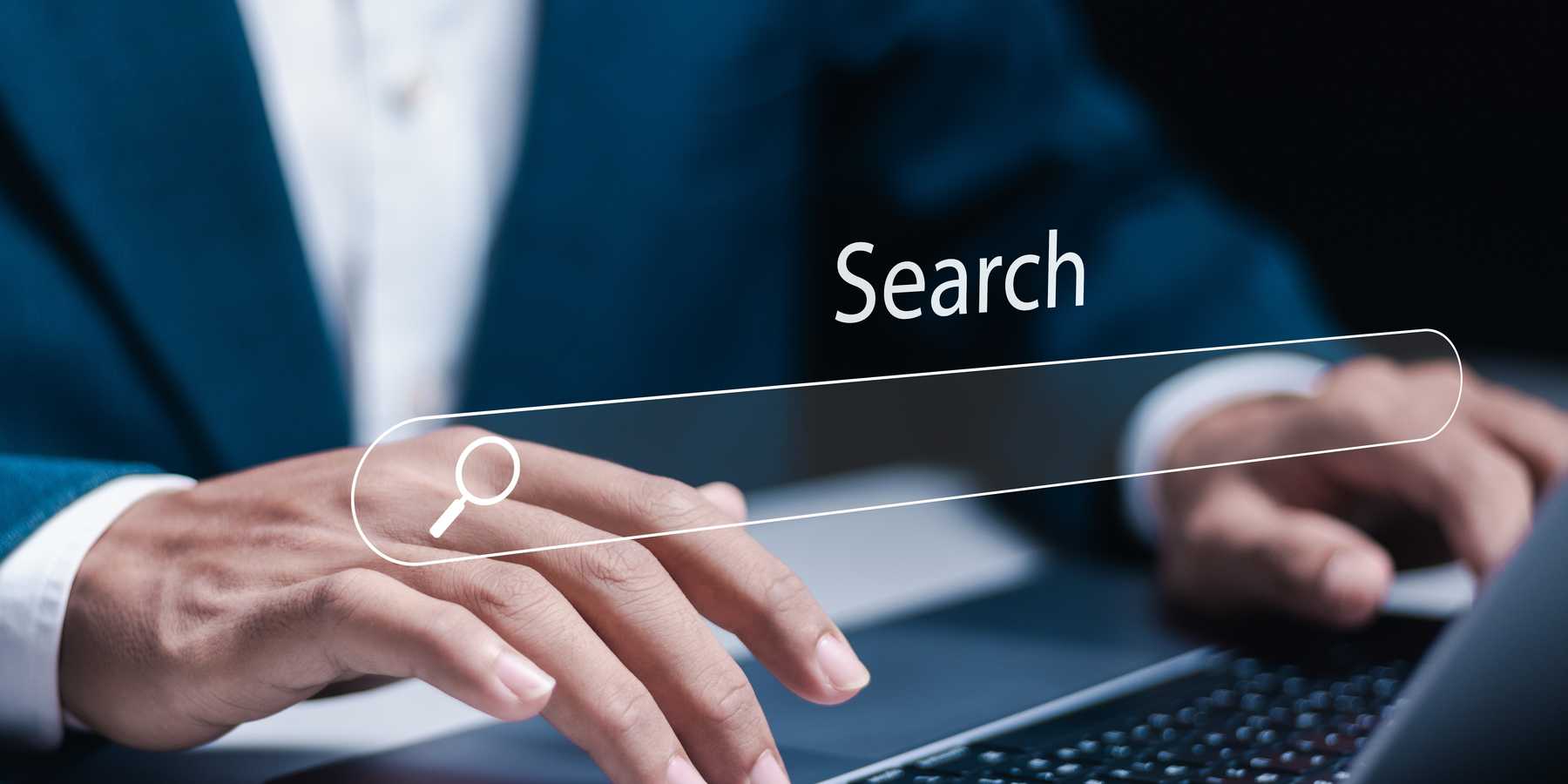 Small business owner doing online research to find potential customers