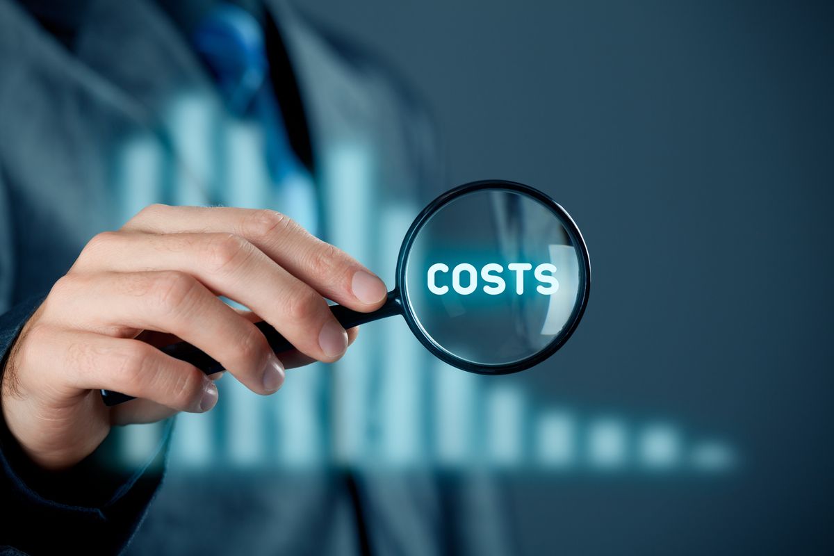 Small business owner focusing on hidden costs of running a business