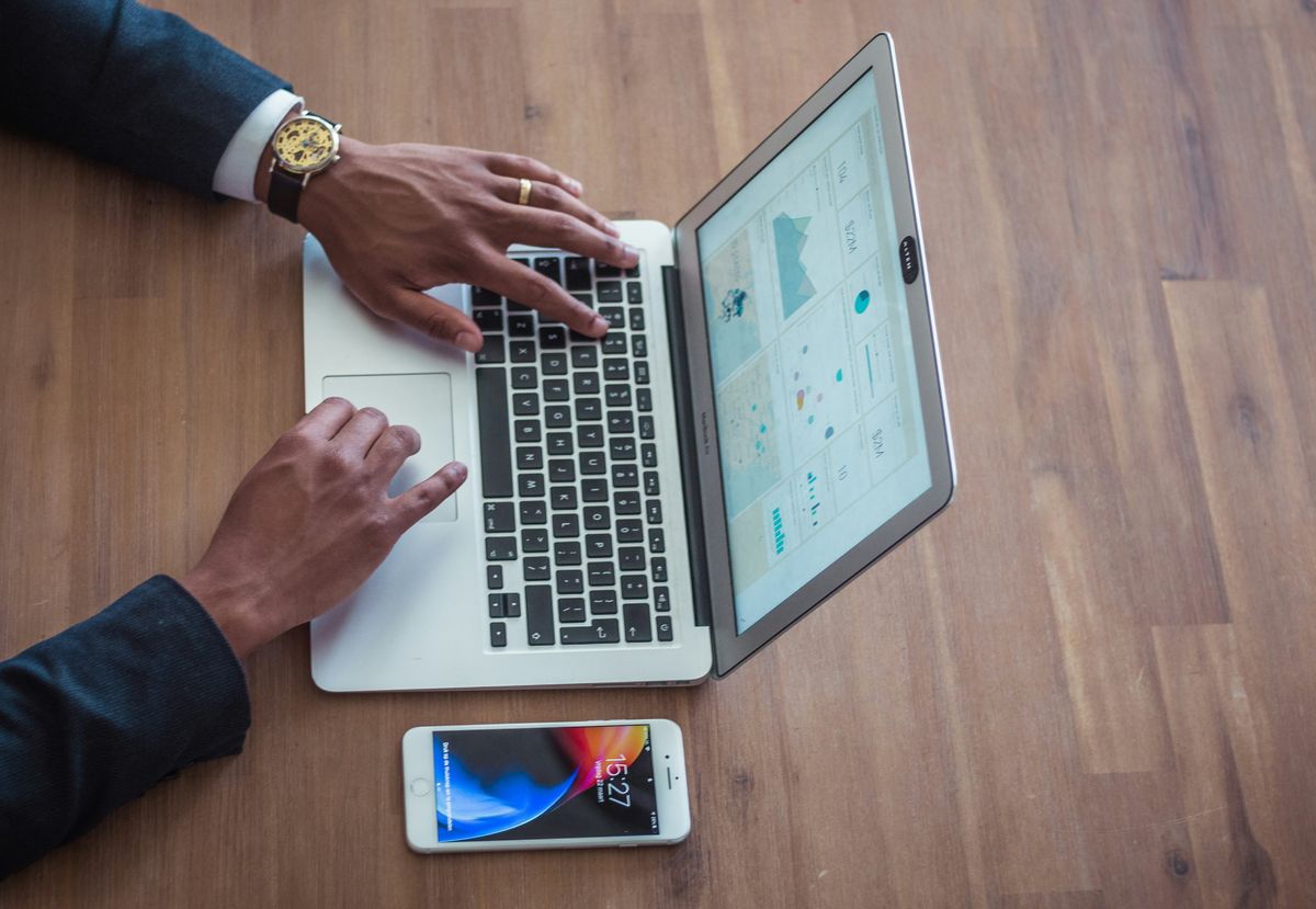Small business owner monitoring business growth