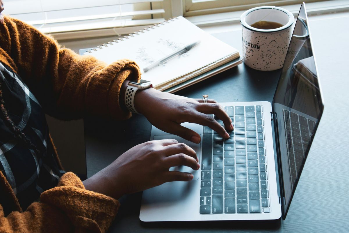 Small business owner writing a business plan