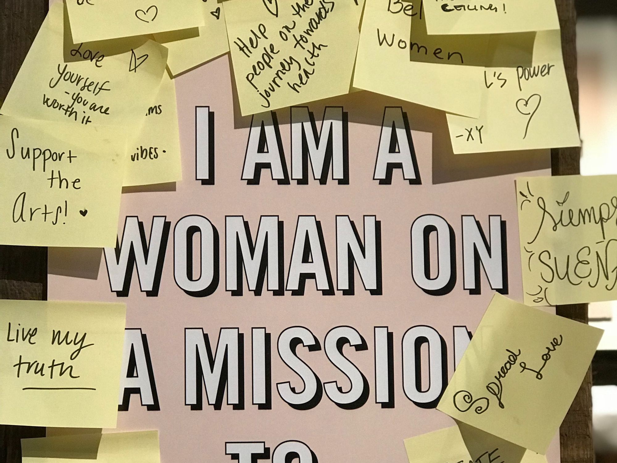 sticky notes serve as a vision board for entrepreneur