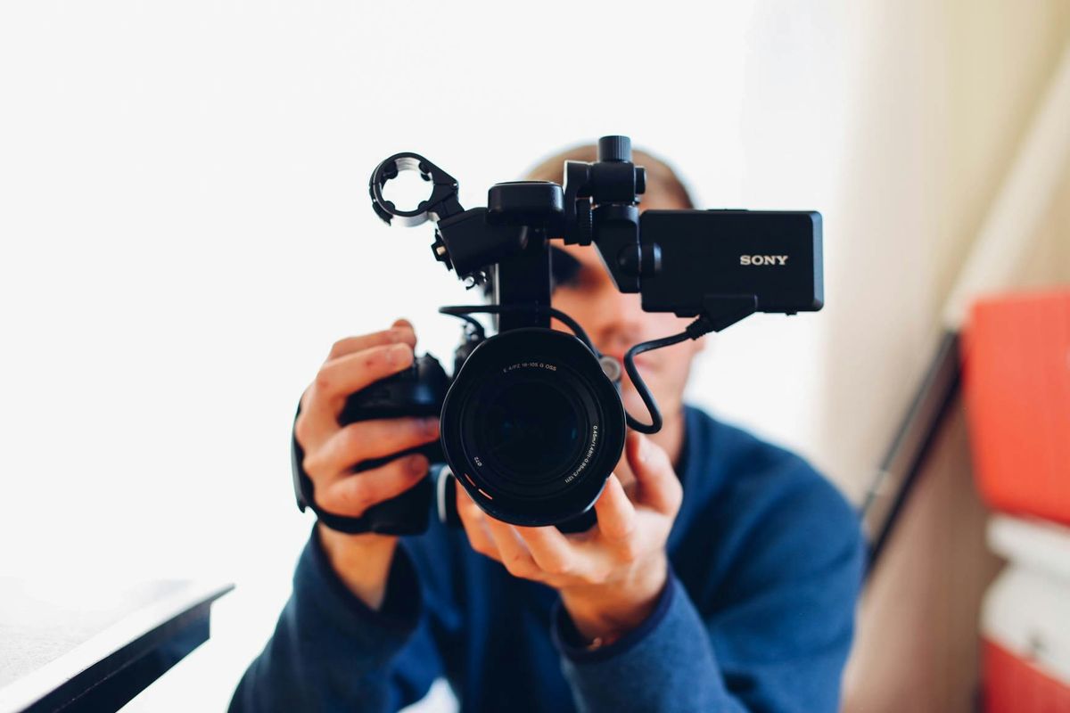 Taking a video for marketing a small business
