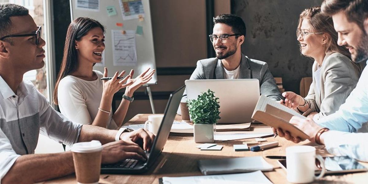 Team in a meeting of an employee-led committee