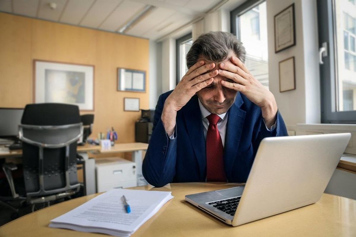 Tired businessman in the office