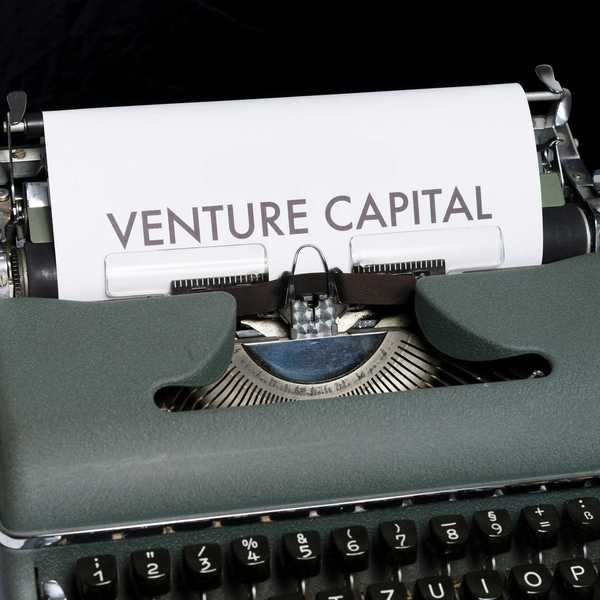 Typewriter with a page on it spelling out venture capital