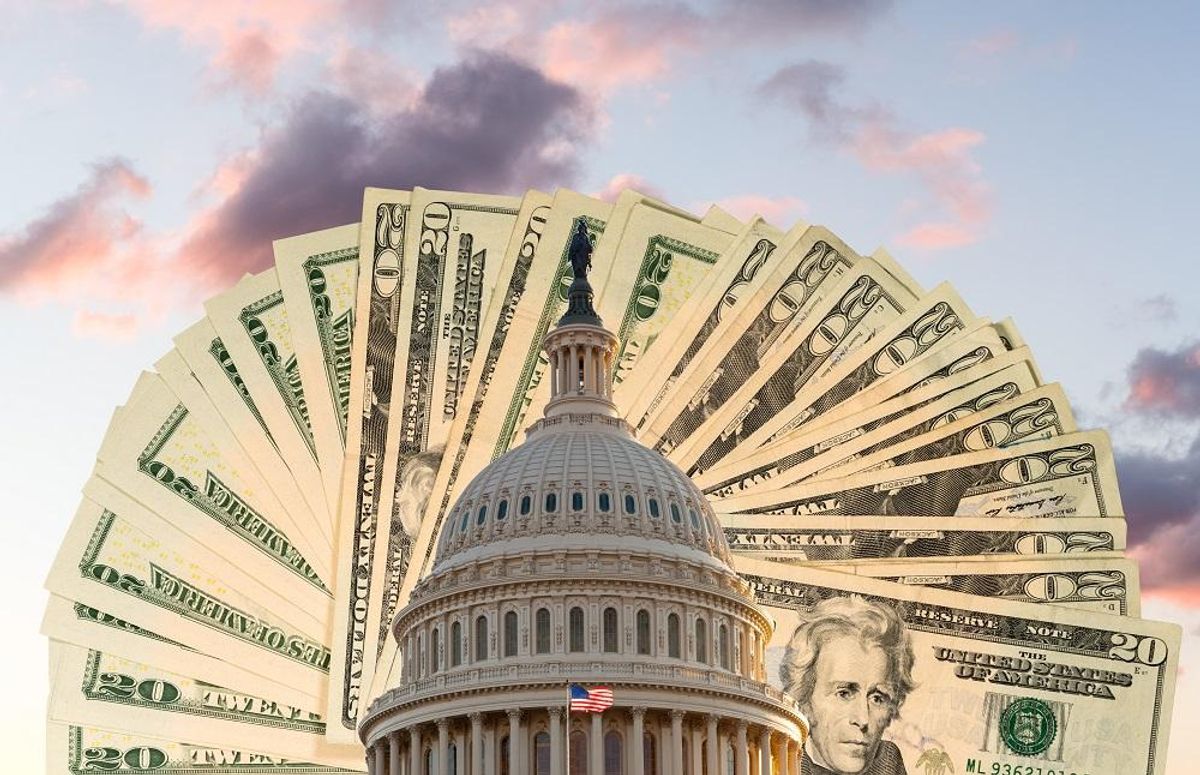 US Capitol in Washington DC with cash behind