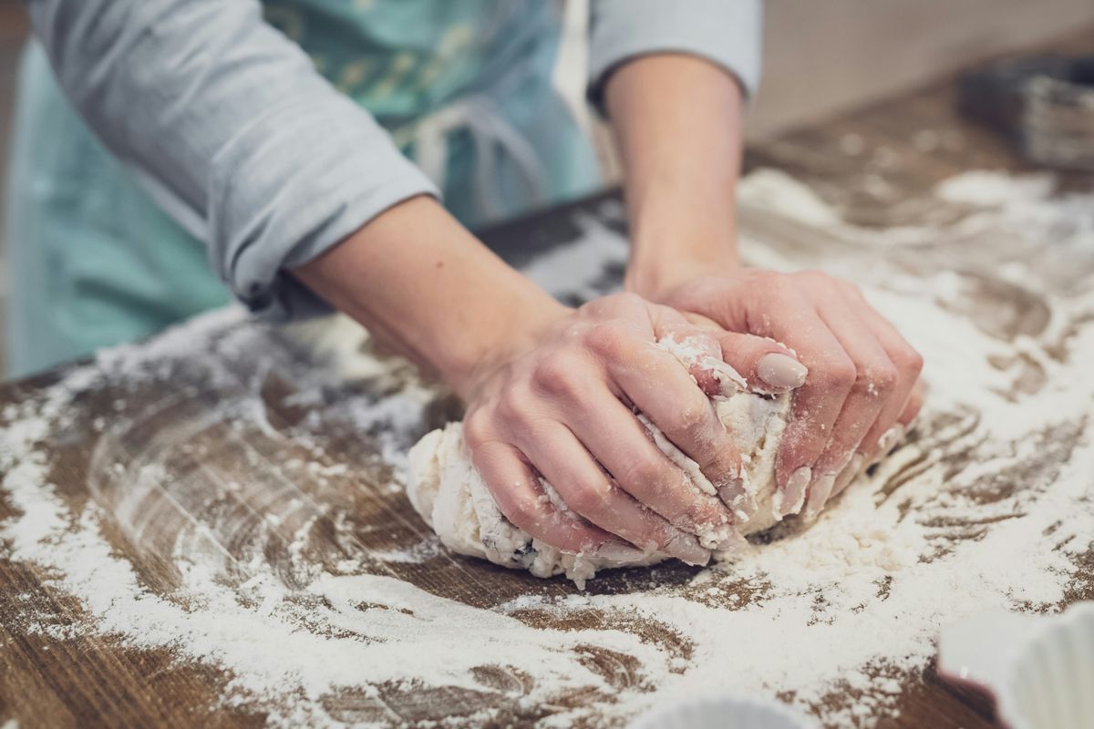 woman baking as a side hustle - Business Help and Advice Woman baking as a side hustle