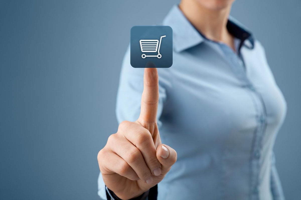Woman click on virtual e-shop button