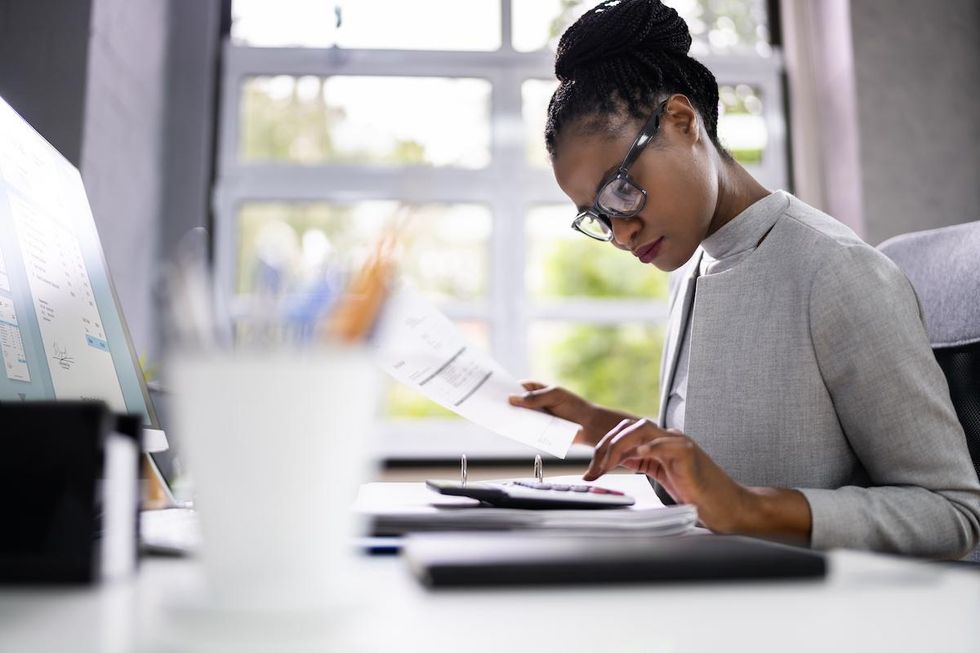 Woman entrepreneur working on starting her business