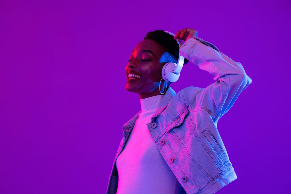 Woman listening one of the top 10 songs of all time