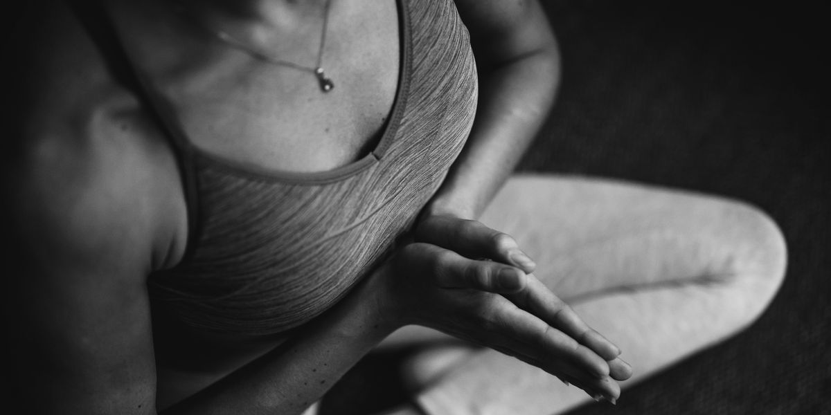 Woman meditating as part of her spiritual business practice