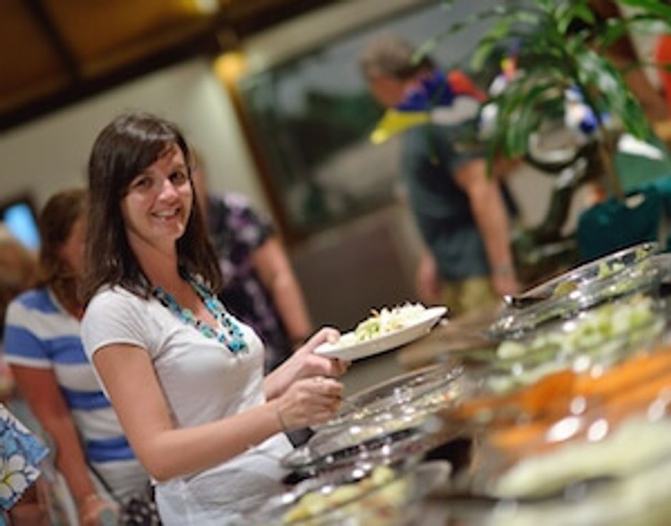 woman serving herself food