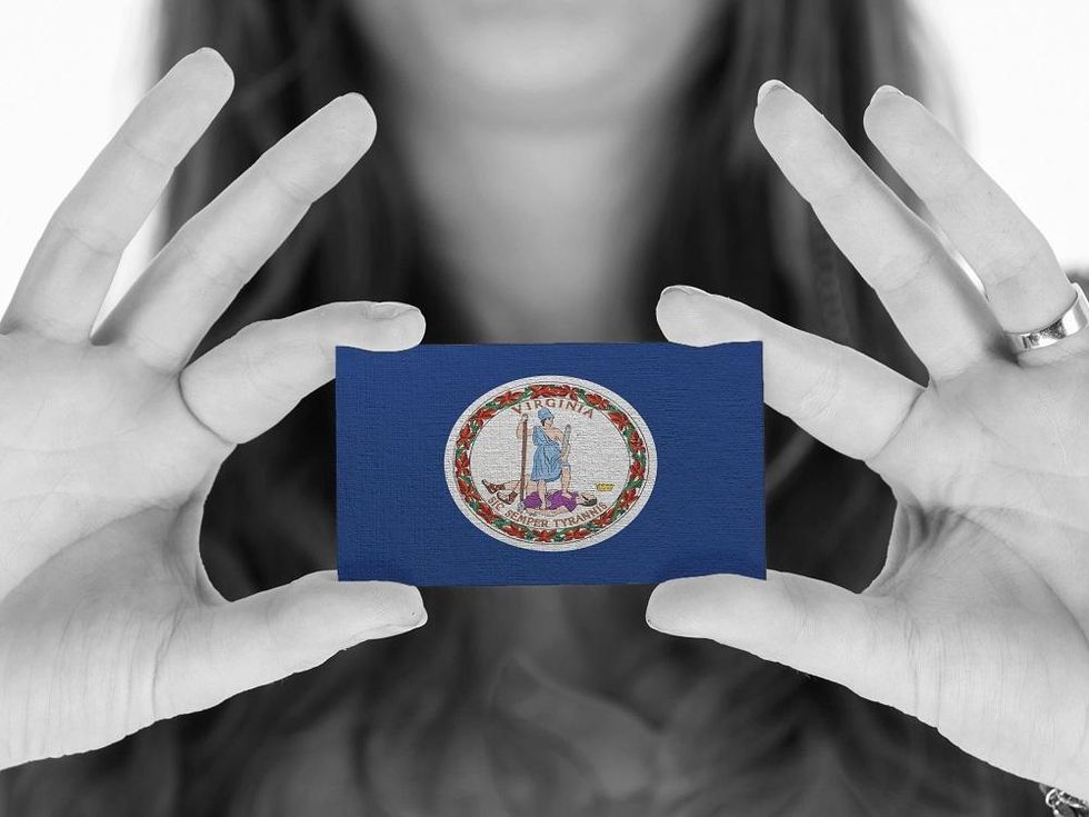 Woman showing a business card