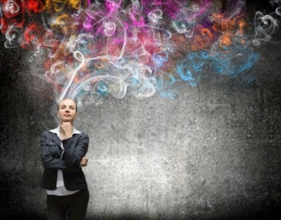 woman thinking of creative ideas to start a business