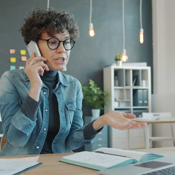 Woman underpromising to a business client