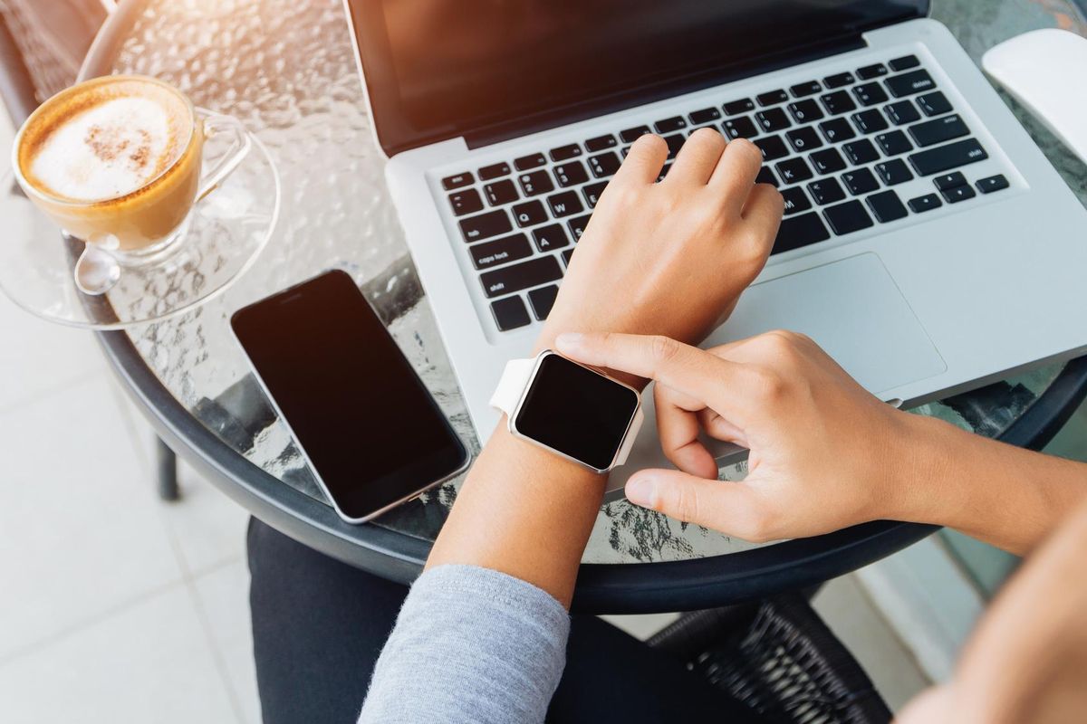 woman using smart watch