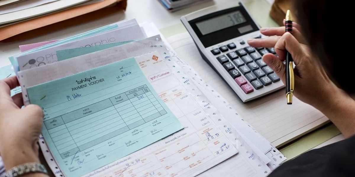 Woman working on her LLC's small business taxes