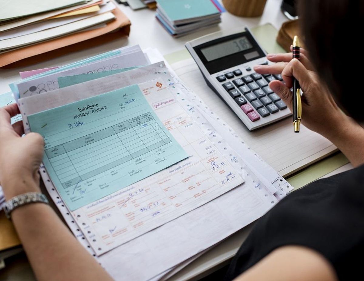 woman working through paperwork