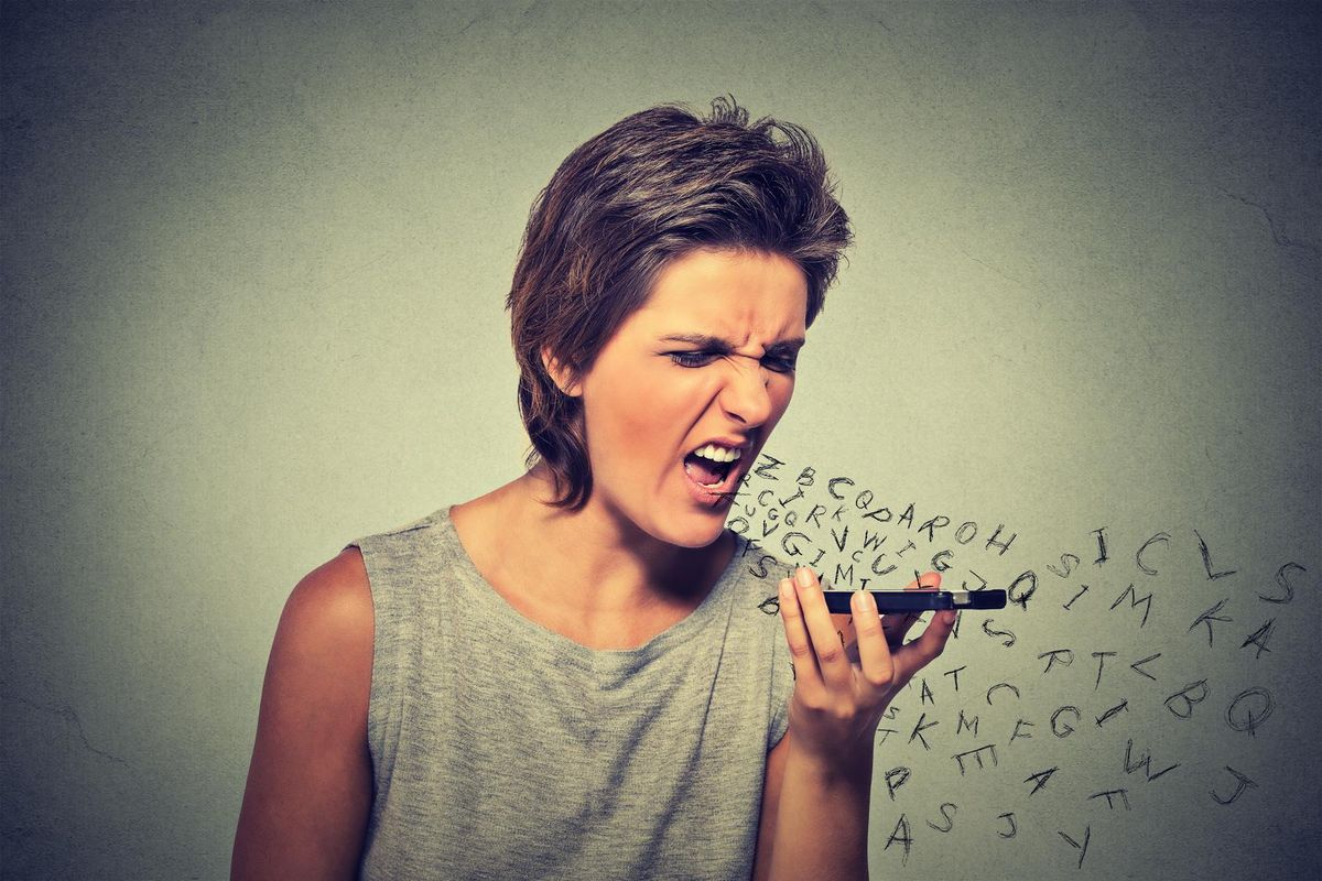 Workplace bully screaming at colleagues on the phone