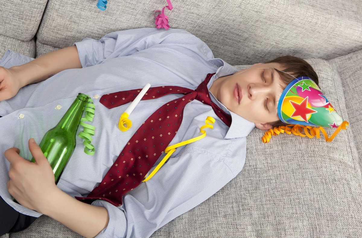 young businessman with a drinking problem
