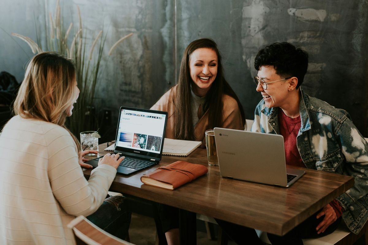 Young interns work together at  a small business